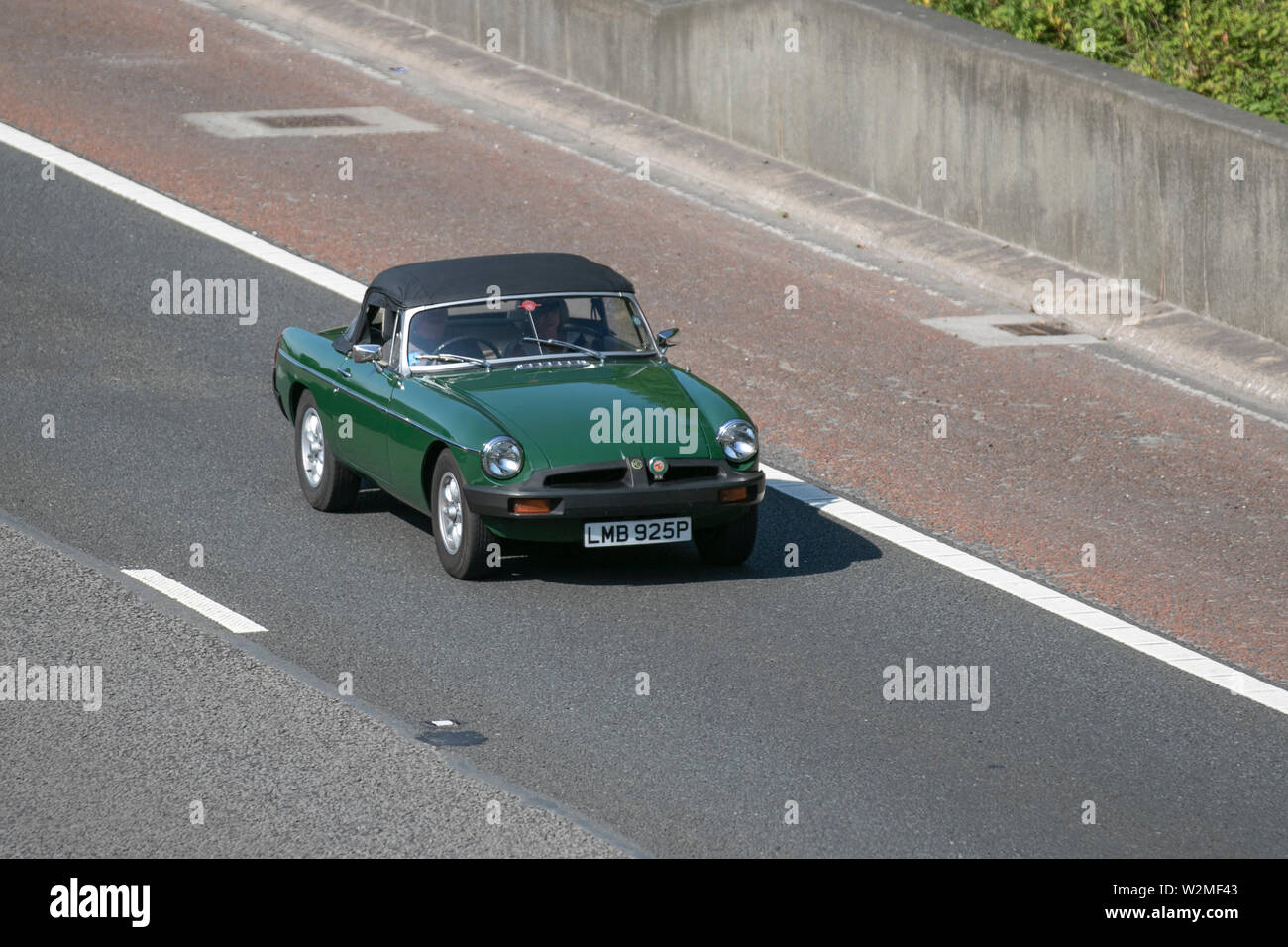 LMB925P green 1975 MG B GT; Motoring classics, historic, vintage motors and collectables 2019; Leighton Hall transport show, cars & veteran vehicles of yesteryear on the M6 motorway near Lancaster, UK Stock Photo