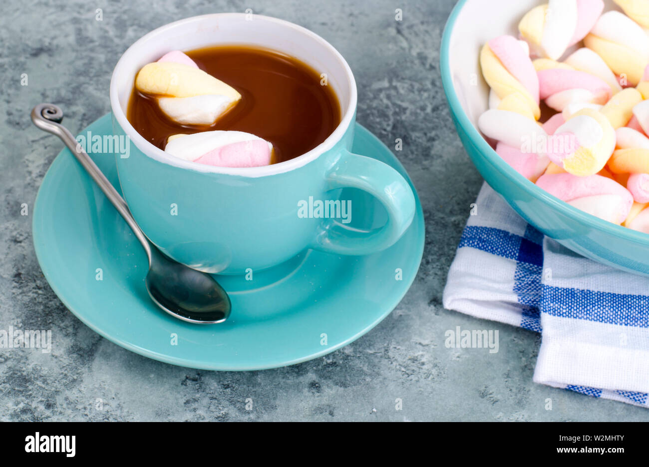 Hot chocolate in blue cup with marshmallows Stock Photo