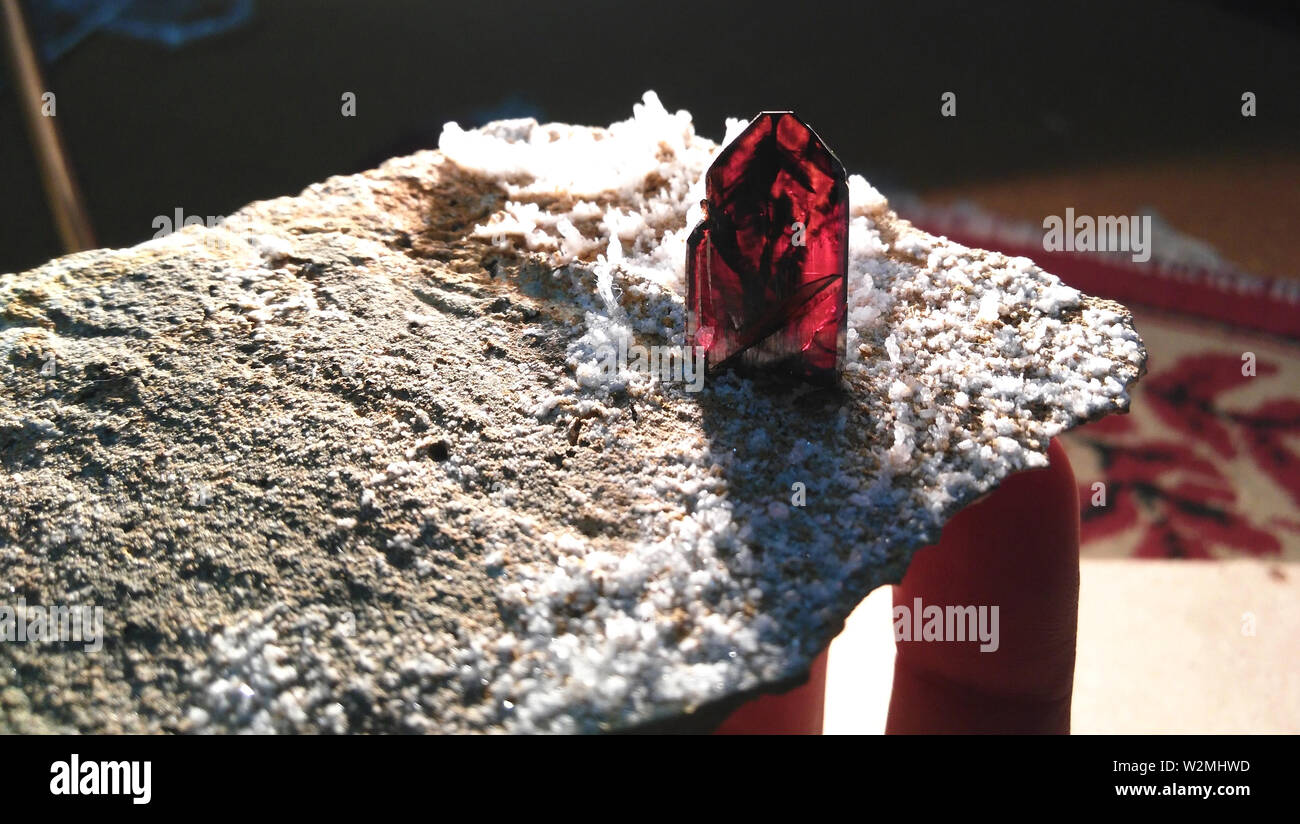 Brookite Specimen with white quartz crystals origin Pakistan. Stock Photo