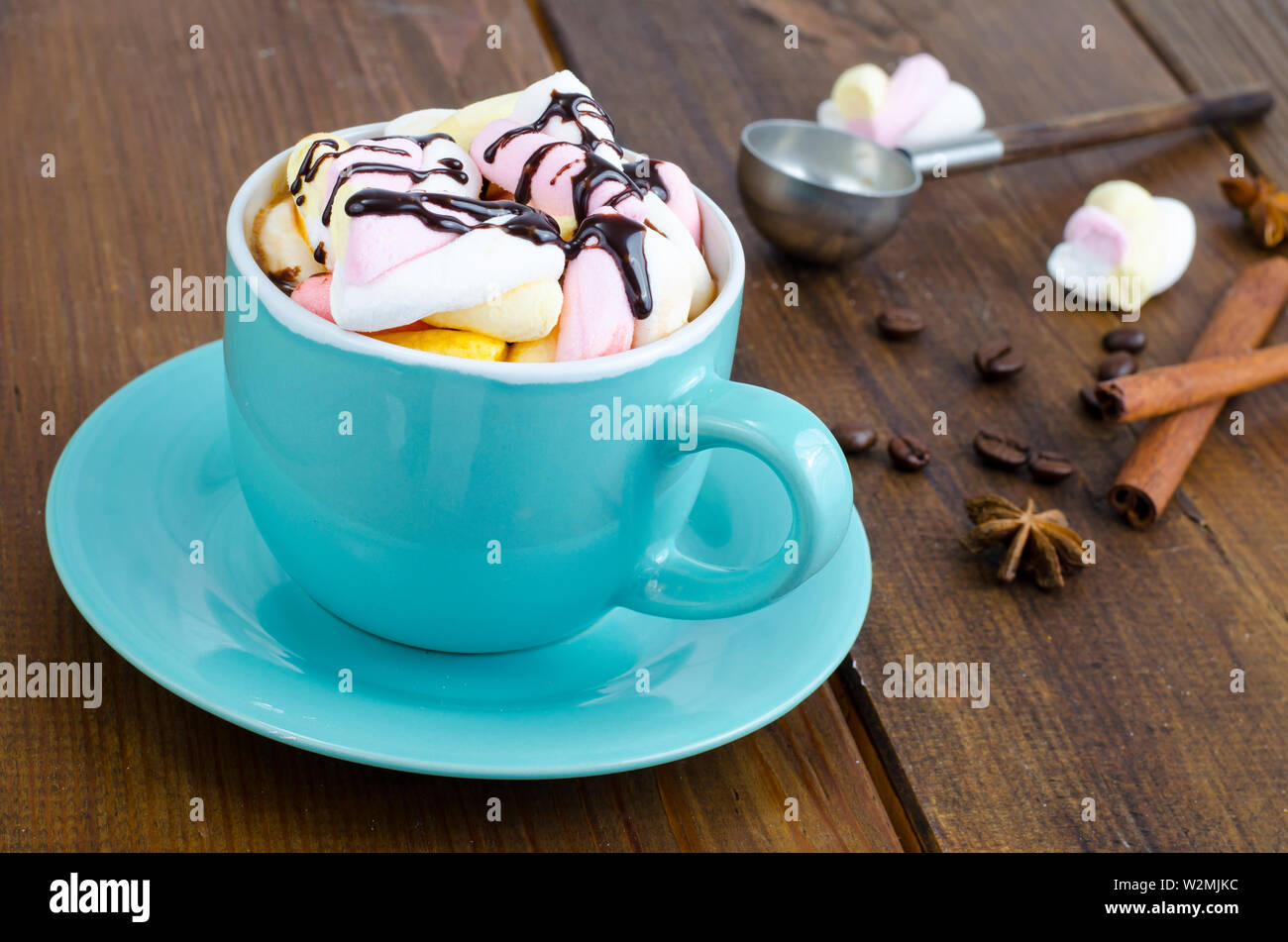Hot chocolate in blue cup with marshmallows Stock Photo