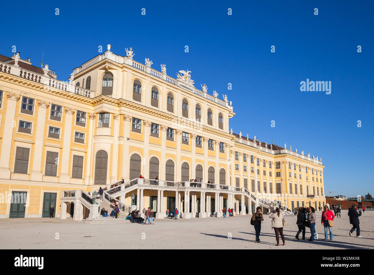 Vienna, Austria - November 1, 2015: People are near Schonbrunn Palace. It is a former imperial summer residence of successive Habsburg monarchs Stock Photo