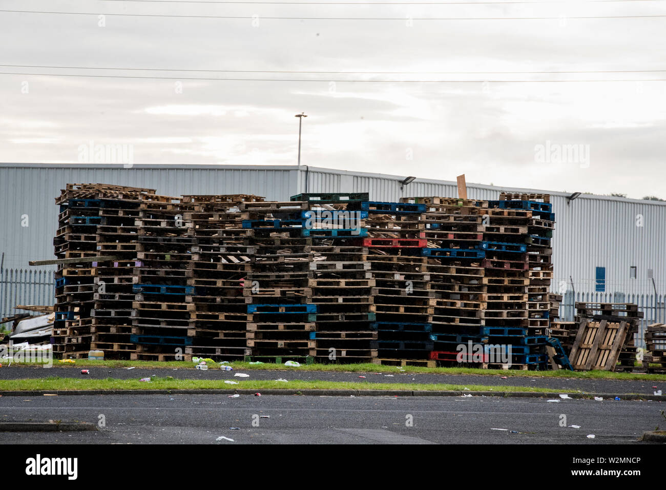 A contentious 11th night bonfire stands in Avoniel Leisure Centre in Belfast. A committee meeting of Belfast City councillors ruled on Monday (08 July 2019) that materials should be removed. Stock Photo