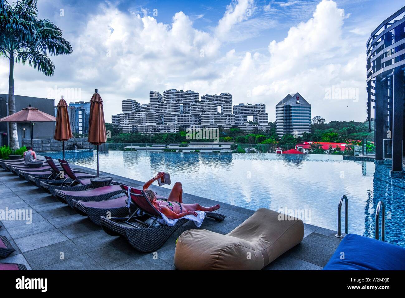 Singapore, from the pool of Park Hotel Alexandra, view to the famed Interface building. Stock Photo