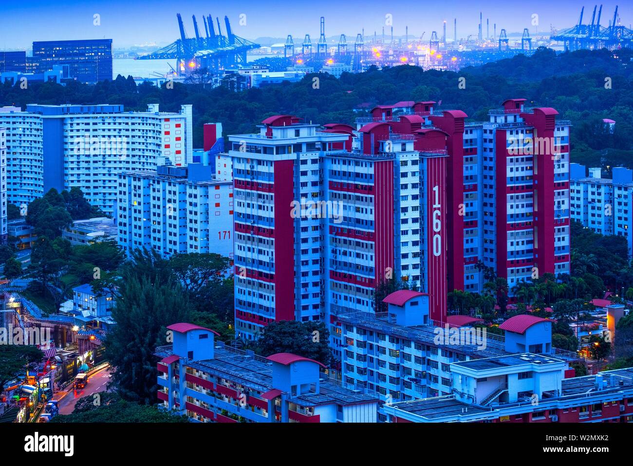 Singapore, Public housing and commercial harbour..Public housing in Singapore is managed by the Housing and Development Board (HDB) under temporary Stock Photo