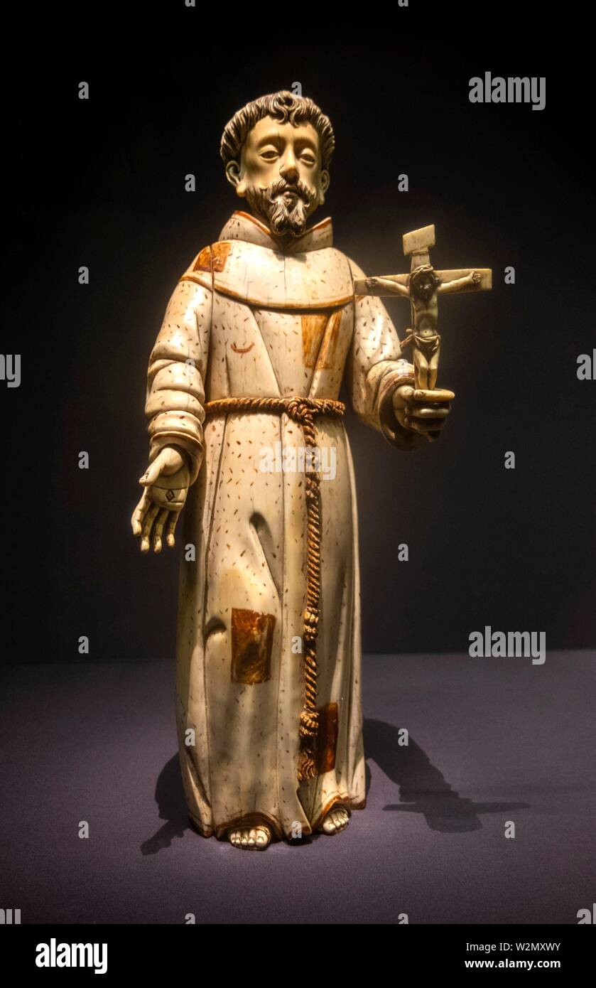 Singapore, Asian Civilisations Museum:.Saint Francis of Assisi..(Philippines, Manila, 17th. century).Ivory with gilded decoration. Stock Photo
