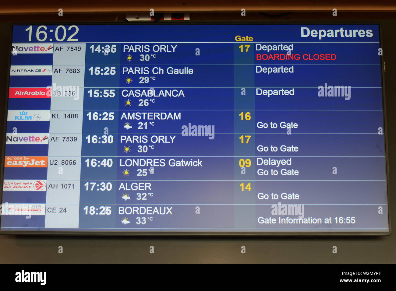 DEPARTURES SCREEN AT MONTPELLIER AIRPORT, FRANCE. Stock Photo