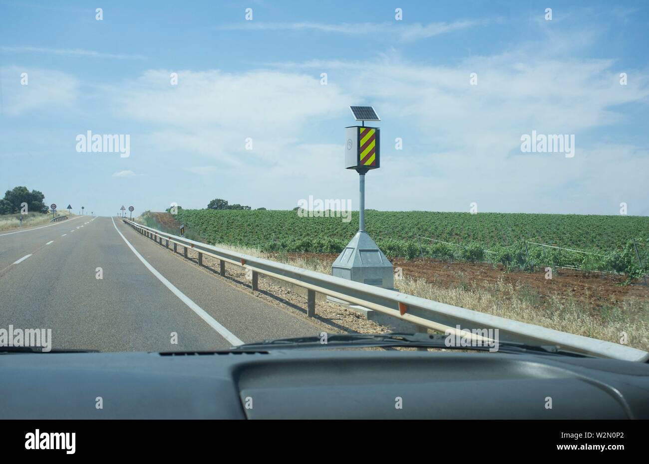 Spanish speed control pole device at country road. View from the inside of the car. Stock Photo