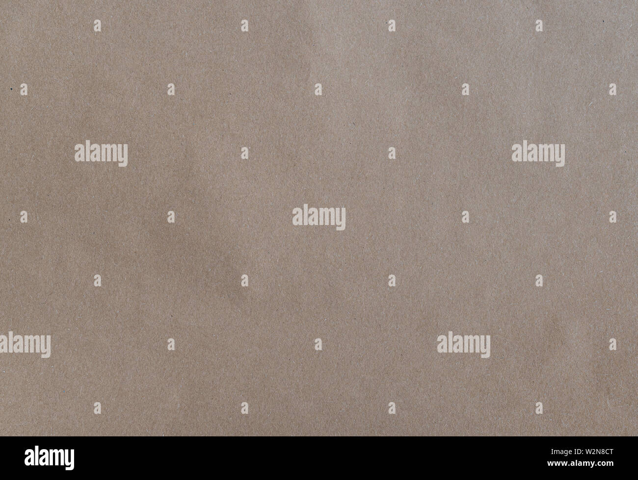 flat brown wrapping paper or packing paper, textured background Stock Photo
