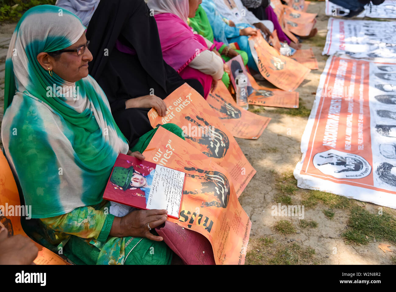 Family Members of the Disappeared Persons hold placards during a demonstration in Srinagar.Association of Parents of Disappeared Persons (APDP) welcomes the recent human rights report from the office of the United Nations High Commissioner for Human Rights (OHCHR) on the situation of human rights in Kashmir Valley published on 08th July 2019. The report covers the human rights violation in Kashmir from May 2018 to April 2019. The OHCHR report highlighted the gross human rights violation done by the military apparatus of India in Kashmir, including enforced disappearances, unlawful killings of Stock Photo