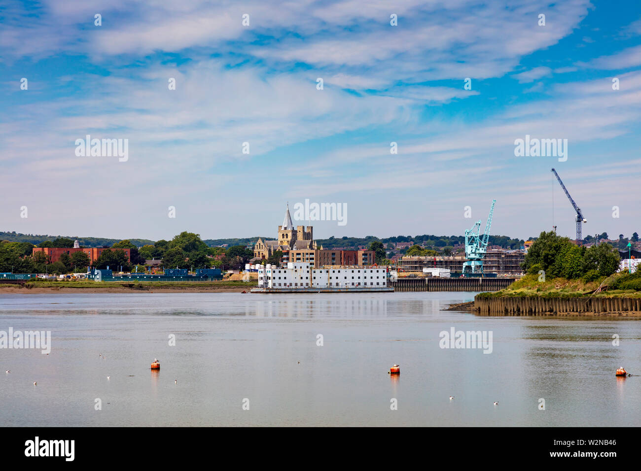 Views upriver from Chatham waterfront along the River Medway towards Rochester and Strood, Meway Towns, Kent, UK Stock Photo