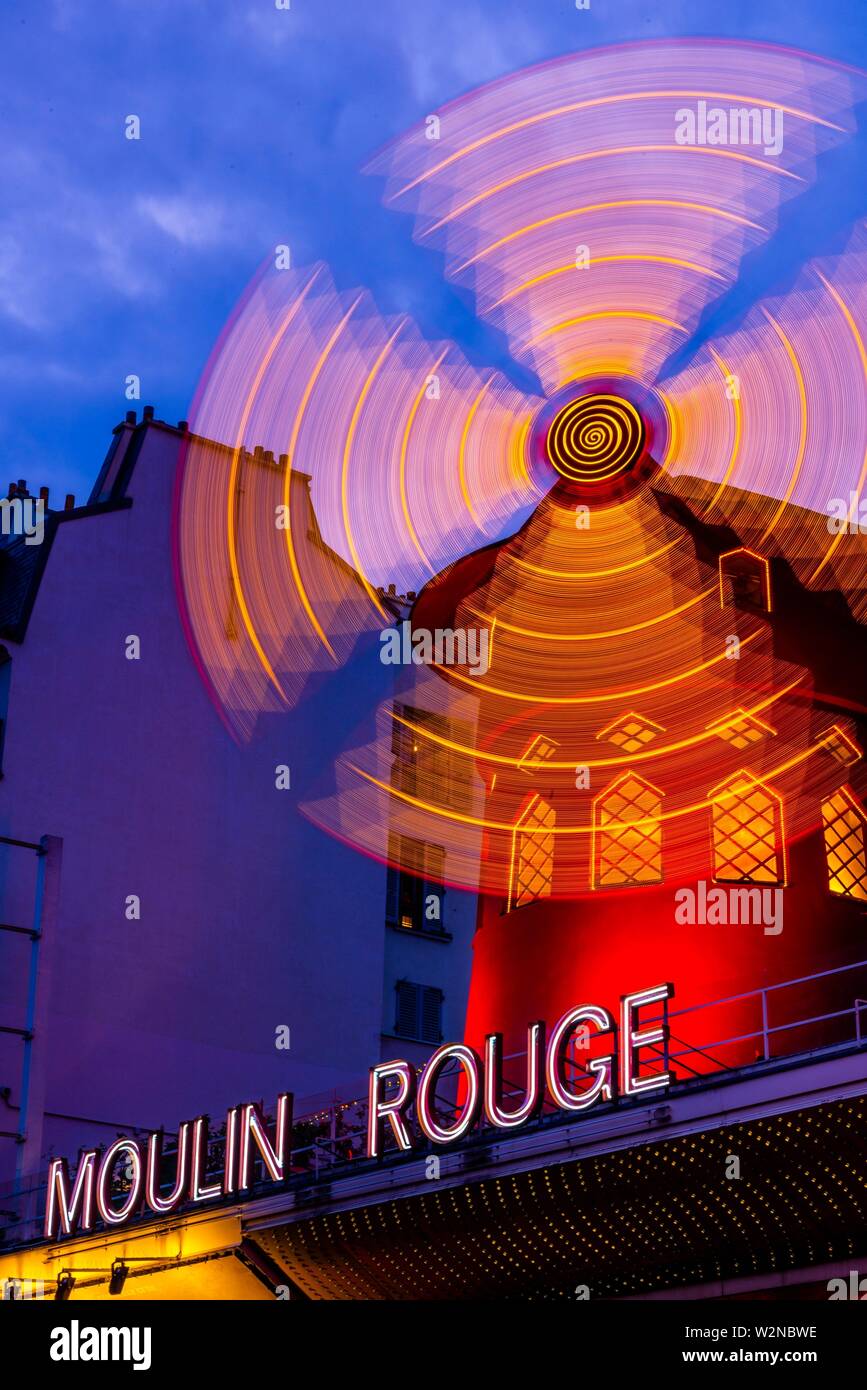 Moulin Rouge (French for Red Windmill) is a tourist attraction in Pigalle on Boulevard de Clichy, 18th arrondissement. It is best known as the Stock Photo