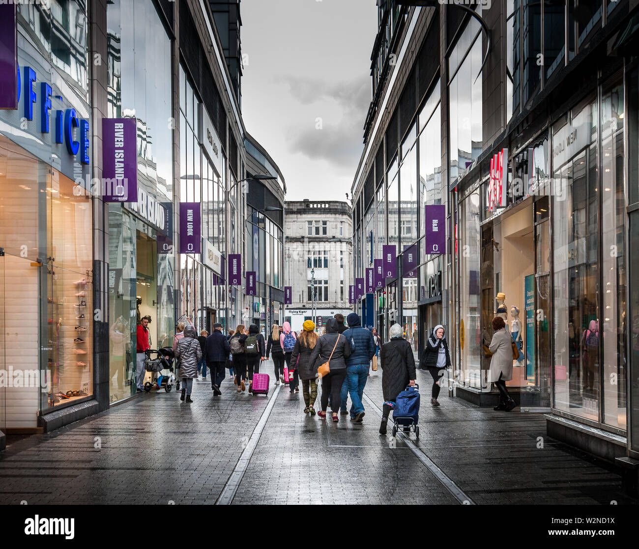 Cork City, Cork, Ireland. 05th April, 2019. Shoppers wander through  Opera Lane on a damp cold afternoon on their way to Patrick's Street, Cork Irelan Stock Photo