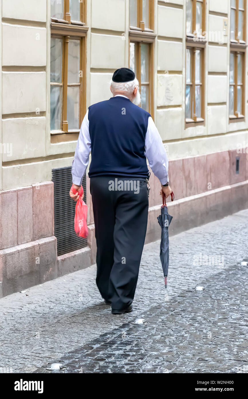 Religious Jewish man walking in Budapest, Hungary Stock Photo