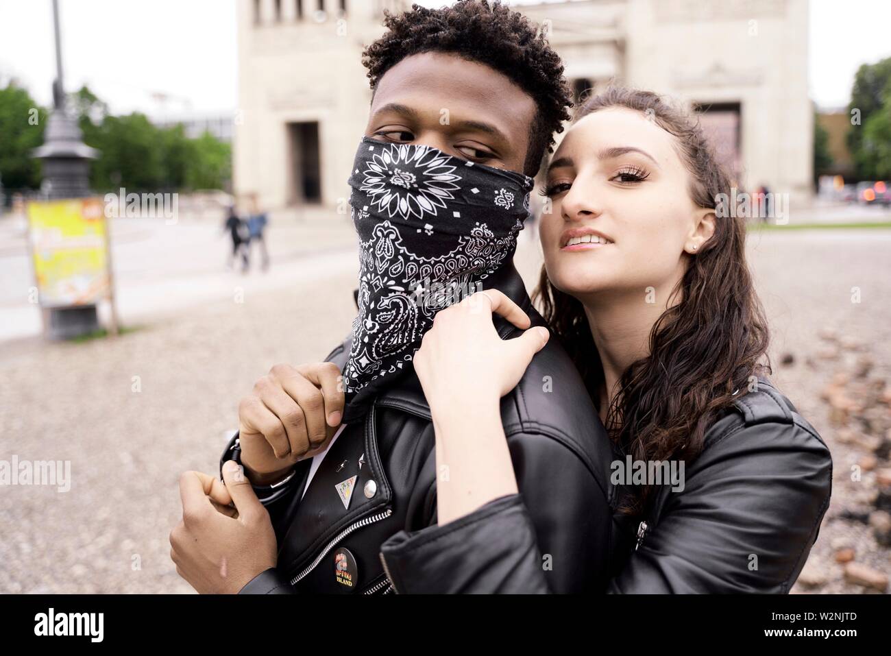 woman with bad boy in city, in Munich, Germany Stock Photo