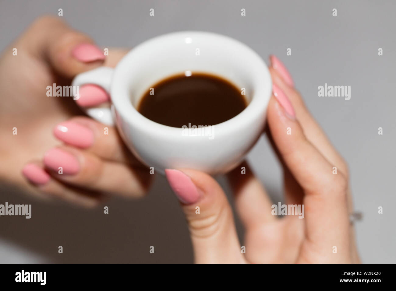 Taking the neapolitan coffee in ceramic cup Stock Photo