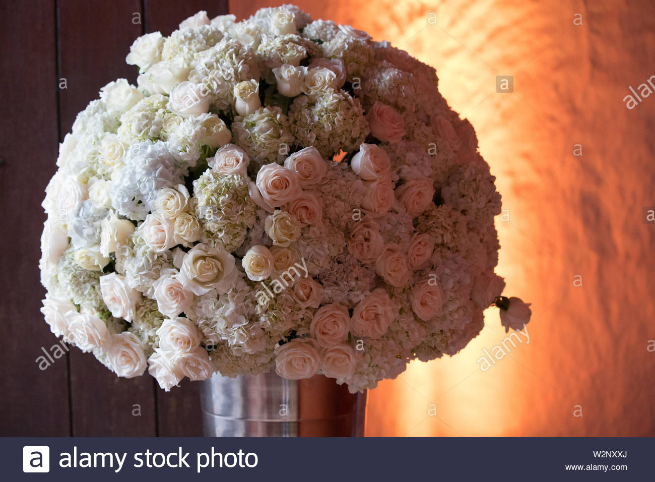 Wedding Church Decoration With Flowers And Orange Lights Church