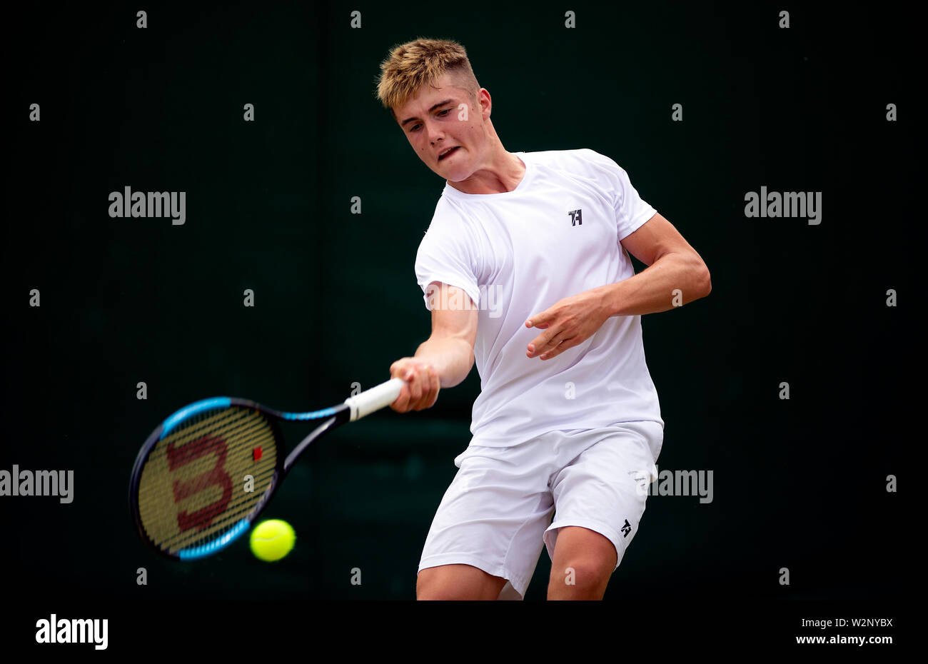 Arthur Fery in action during the Boys singles on day nine of the Wimbledon  Championships at the All England Lawn Tennis and Croquet Club, Wimbledon  Stock Photo - Alamy