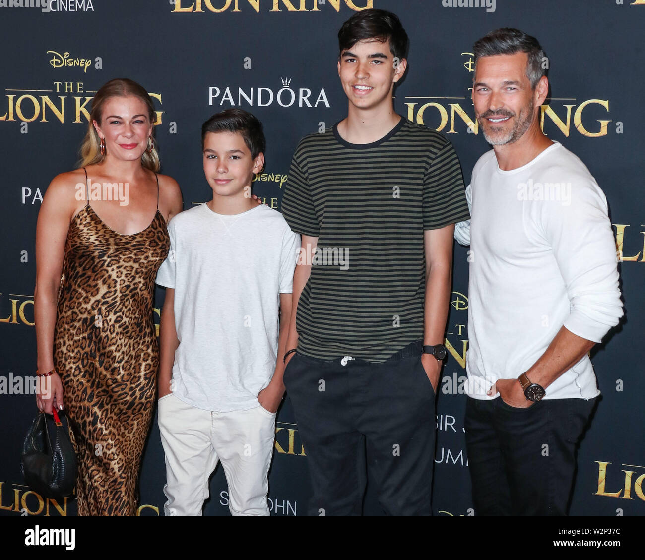 HOLLYWOOD, LOS ANGELES, CALIFORNIA, USA - JULY 09: LeAnn Rimes, Jake Austin Cibrian, Mason Edward Cibrian and Eddie Cibrian arrive at the World Premiere Of Disney's 'The Lion King' held at the Dolby Theatre on July 9, 2019 in Hollywood, Los Angeles, California, United States. (Photo by Xavier Collin/Image Press Agency) Stock Photo
