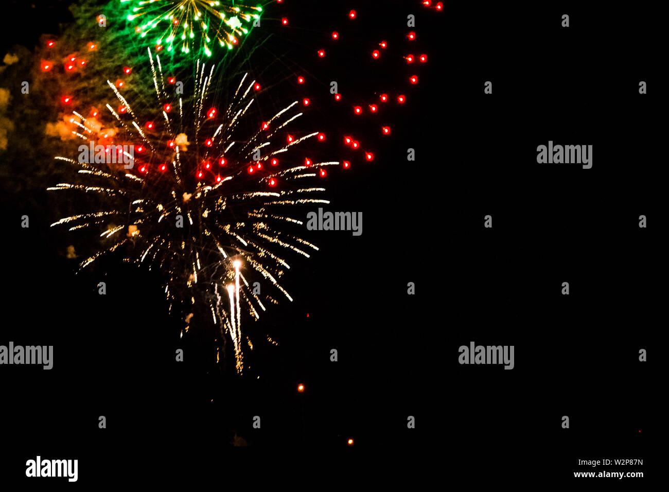 Firework display lighting up the night sky in Grand Rapids Michigan