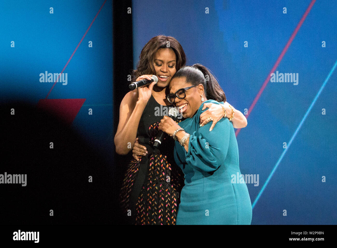 First Lady Michelle Obama and Oprah Winfrey at the 'United States of Women' conference at the Walther Washington Convention Center in Washington D.C. Stock Photo