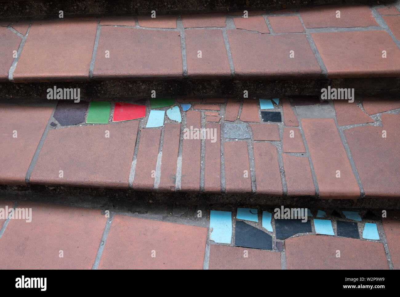 Tiled steps at Hundertwasserhaus, design by artist and architect Friedensreich Hundertwasser (a pseudonym), Vienna, Austria. Stock Photo