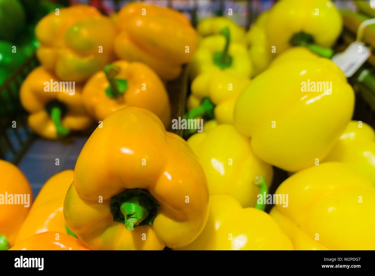collection of colorful bell pepper in the store Stock Photo - Alamy