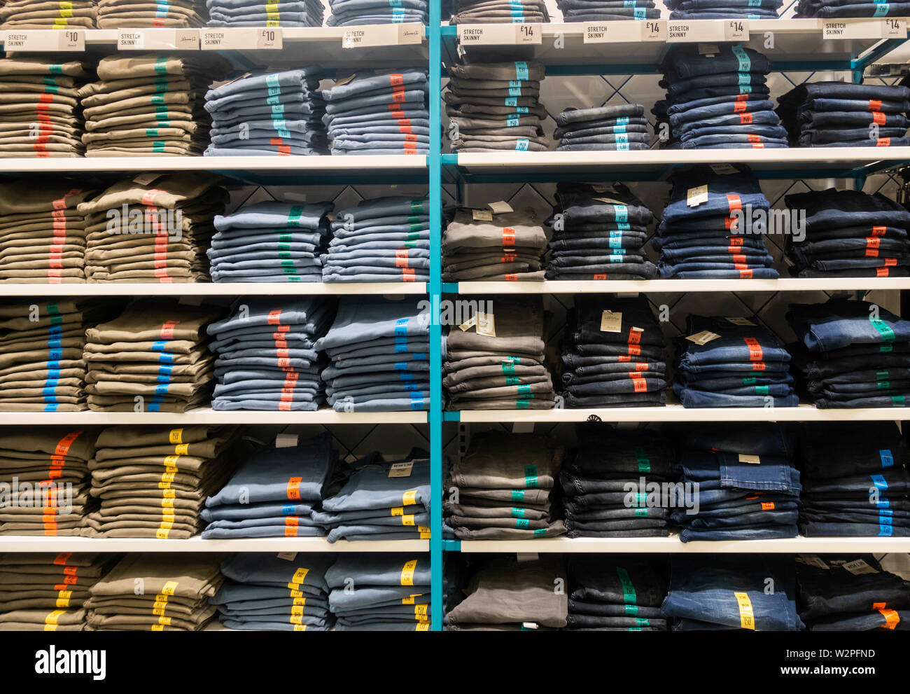 Denim jeans in Primark store. England. UK Stock Photo