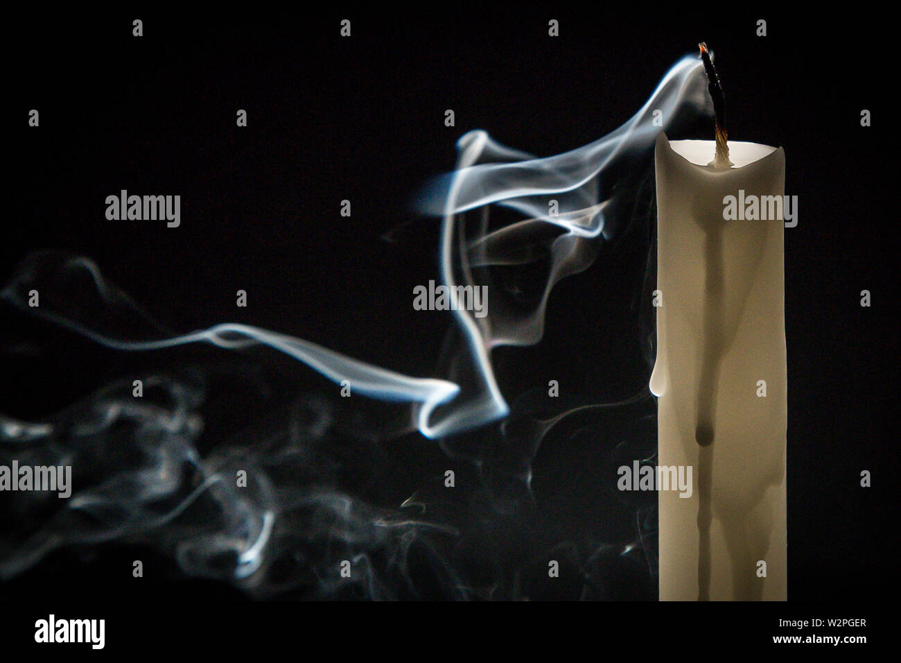 Smoke candle on a black background Stock Photo Alamy