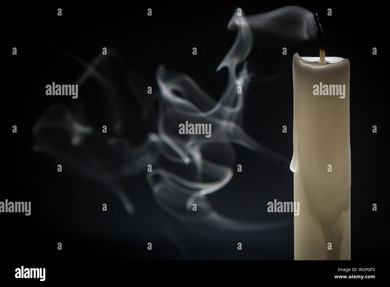 Smoke candle on a black background Stock Photo Alamy