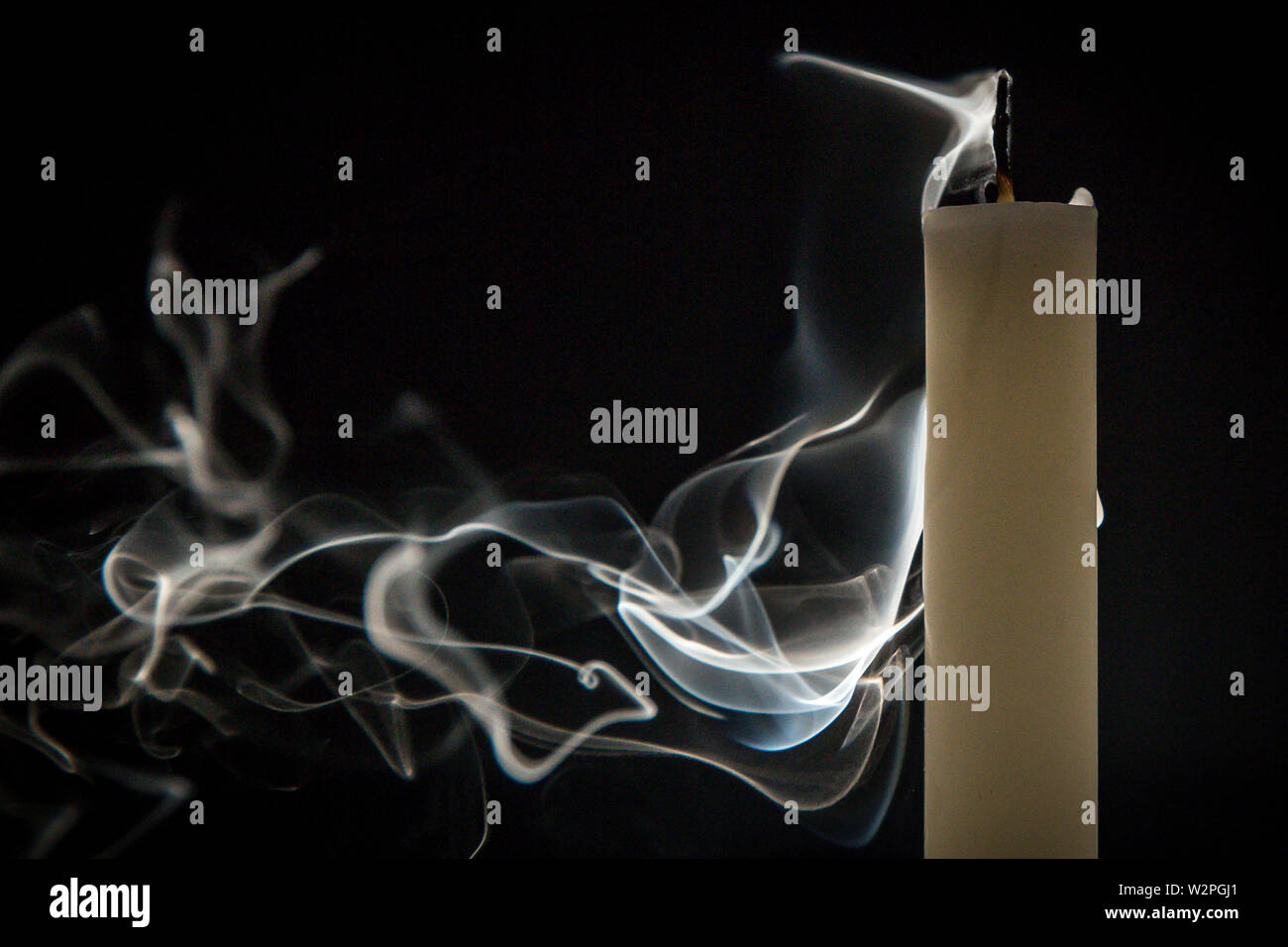 Smoke candle on a black background Stock Photo Alamy