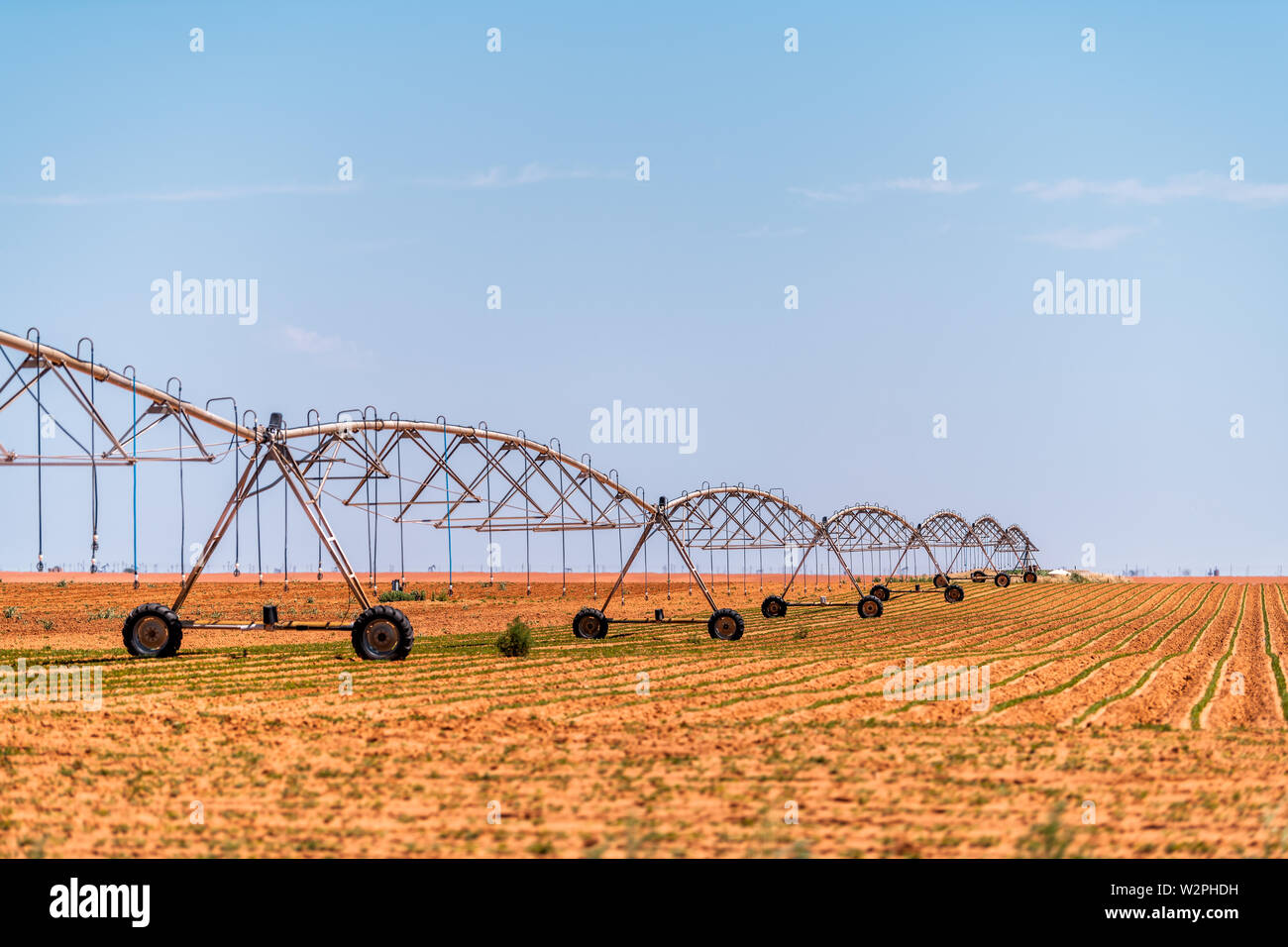 Brownfield, USA Texas rural countryside industrial field with water or