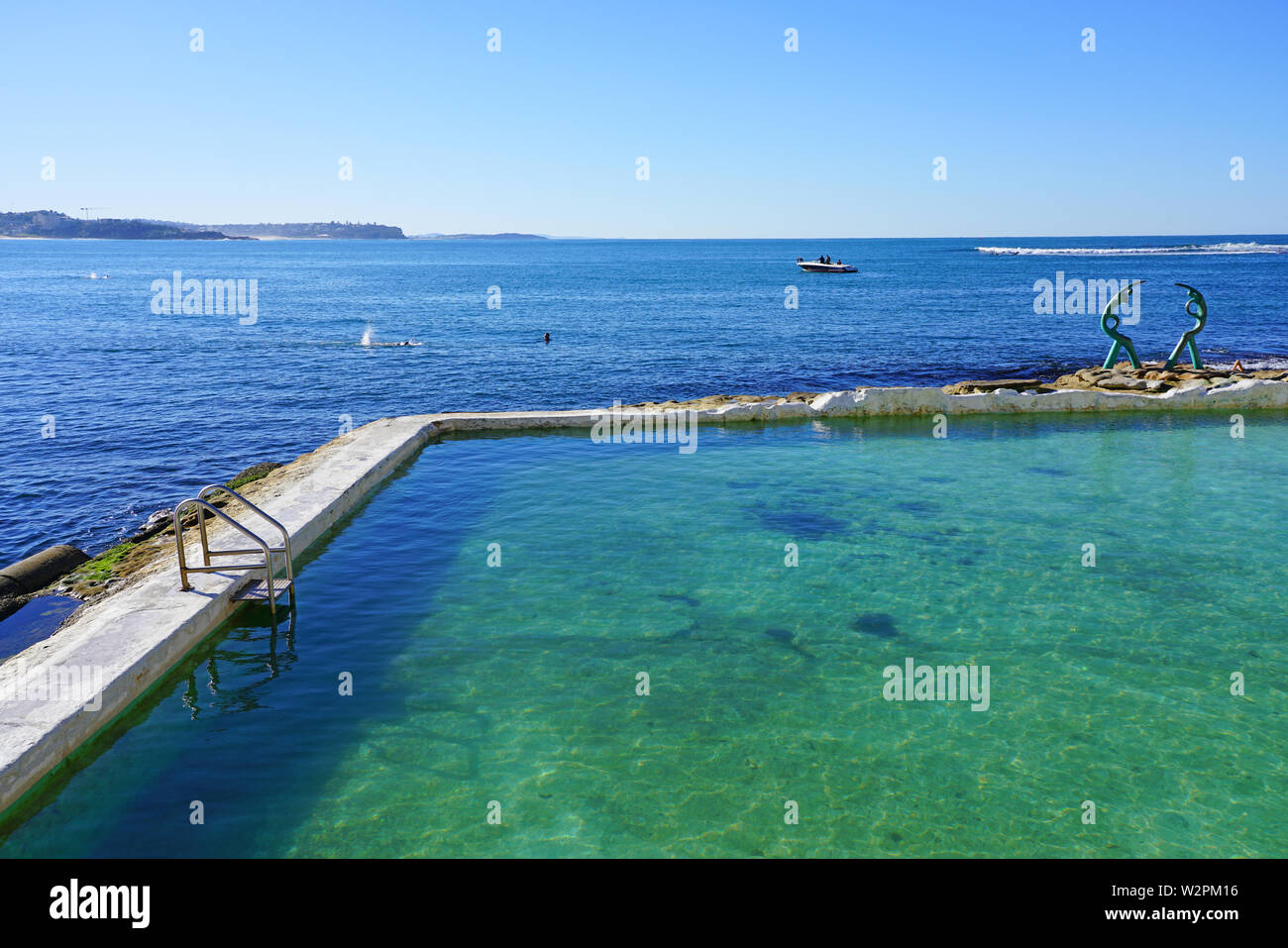 MANLY, AUSTRALIA -15 JUL 2018- View of the Fairy Bower Pool, a triangular rock pool in the Cabbage Tree Bay Aquatic Reserve in Manly on the ocean outs Stock Photo