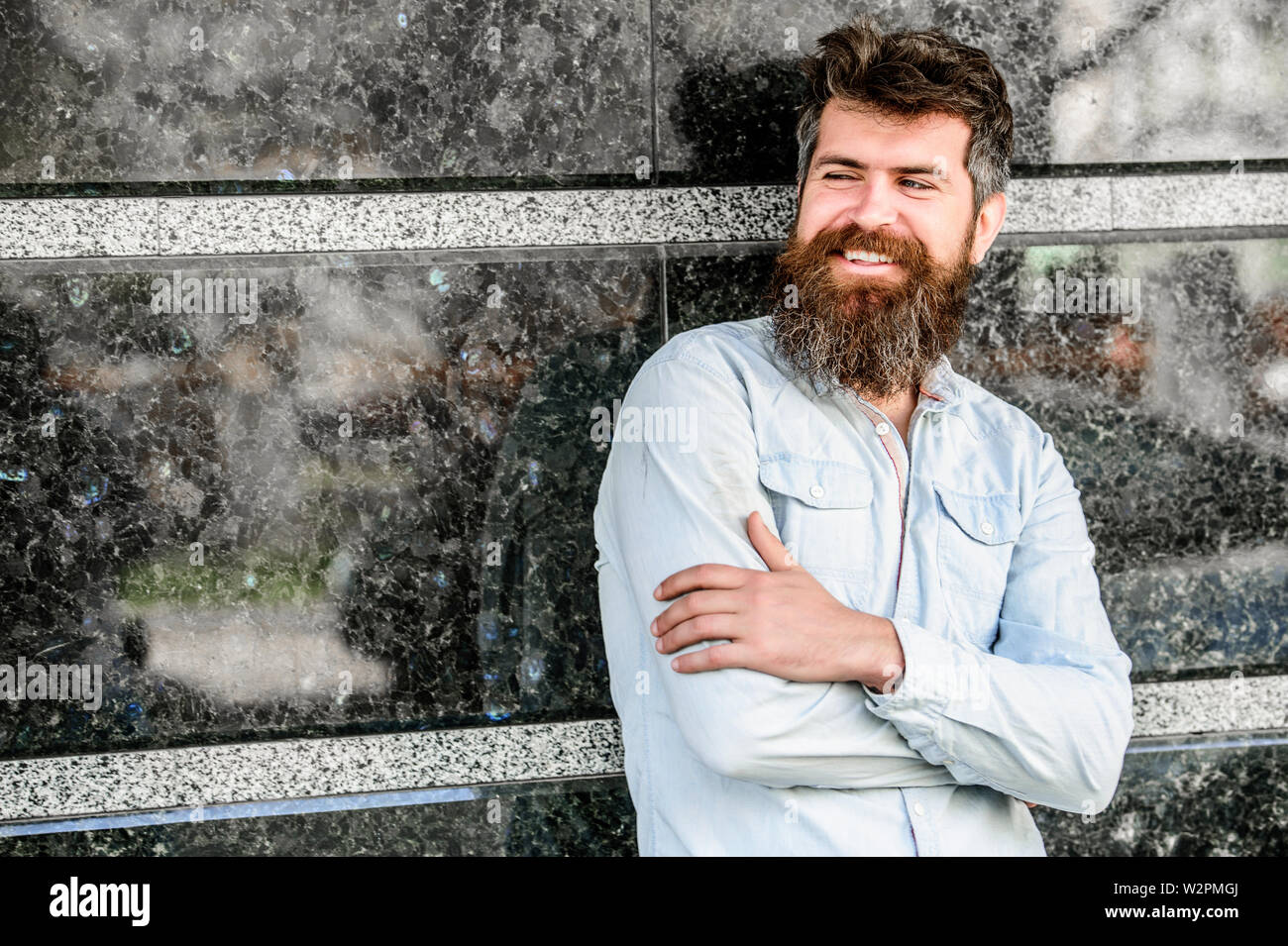 Beard grooming. Guy masculine appearance with long beard. Barber concept. Beard care. Man