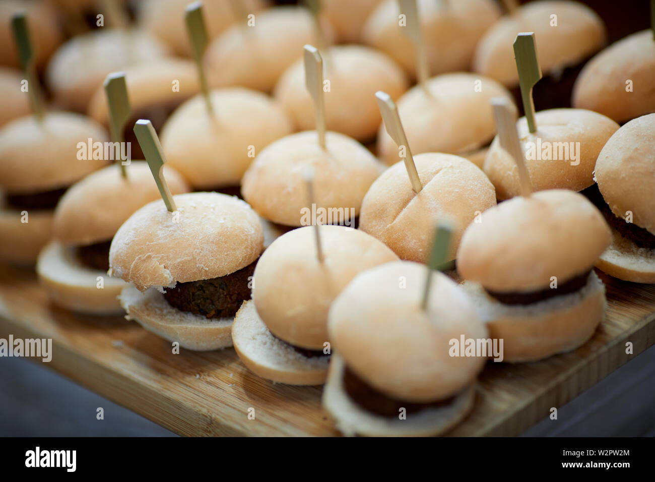 Small slider burgers in buns party food Stock Photo