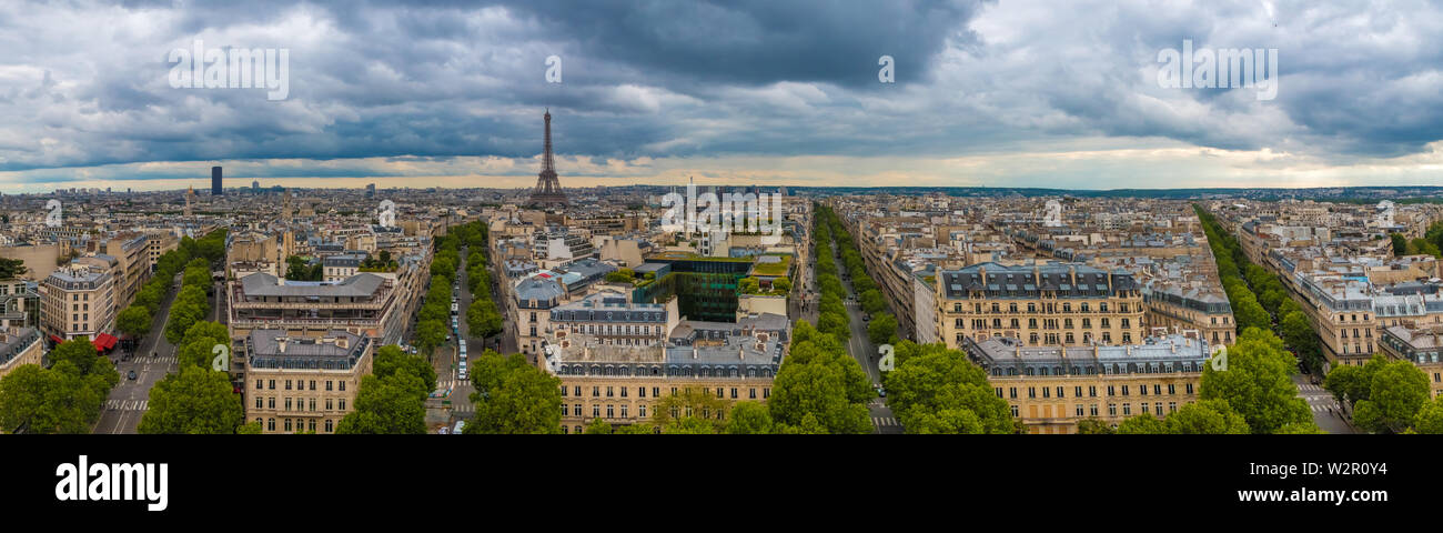 Large aerial panorama picture of the Paris cityscape with the Tour Montparnasse and the Eiffel Tower including Avenue Marceau, Avenue d'Iéna, Avenue... Stock Photo