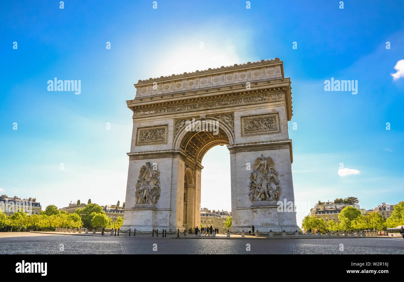 Nice view of the Arc de Triomphe de l'Étoile, one of the most famous and popular monuments in Paris. The two pillars at the west façade shows the... Stock Photo