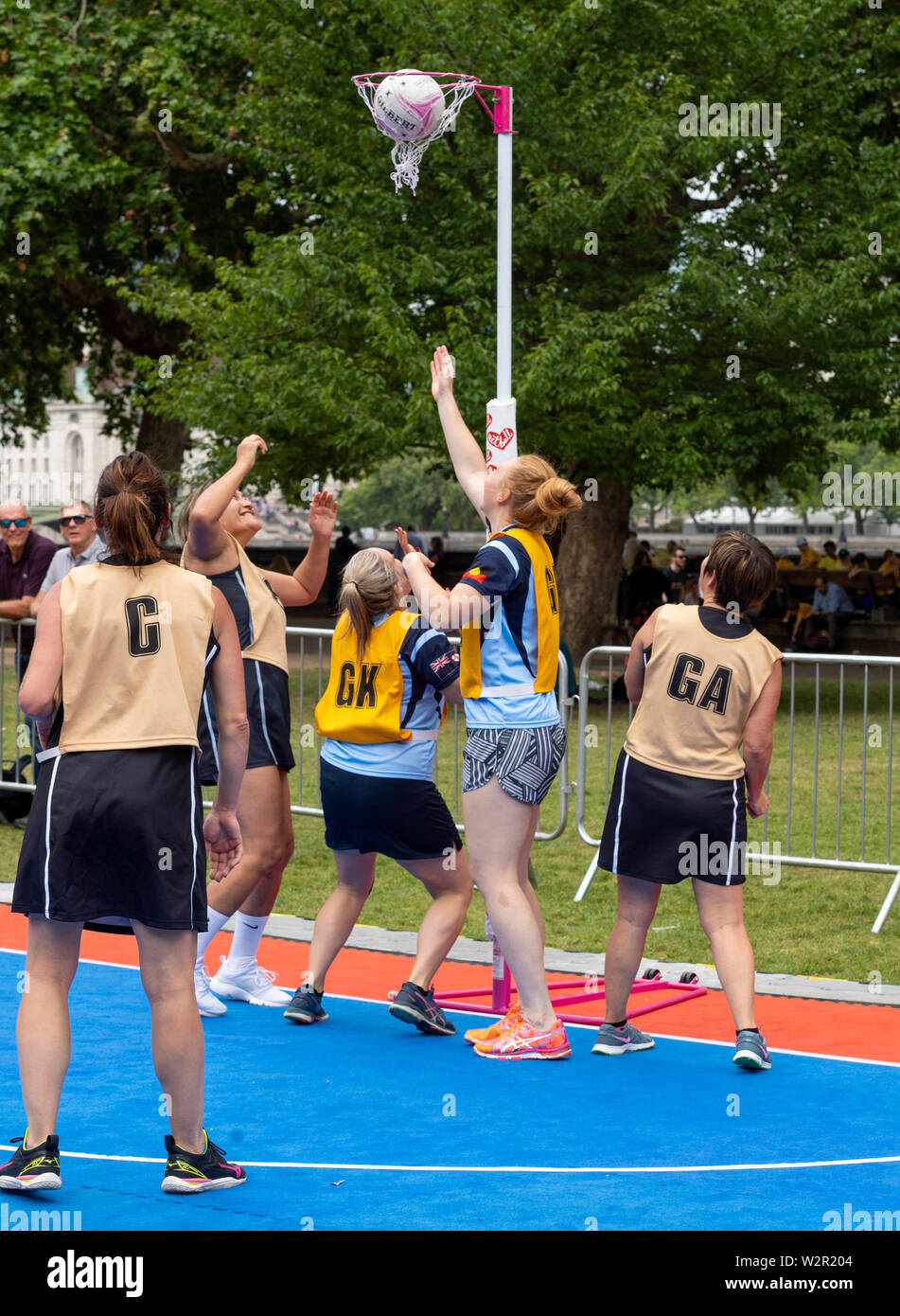 London, UK. 10th July 2019. International Parliamentary Netball competition in Victoria Tower Gardens, played by parliamentary teams representing the UK, New Zealand and Australia. Organised by Netball England ahead of the international netball competition. Credit: Ian Davidson/Alamy Live News Stock Photo