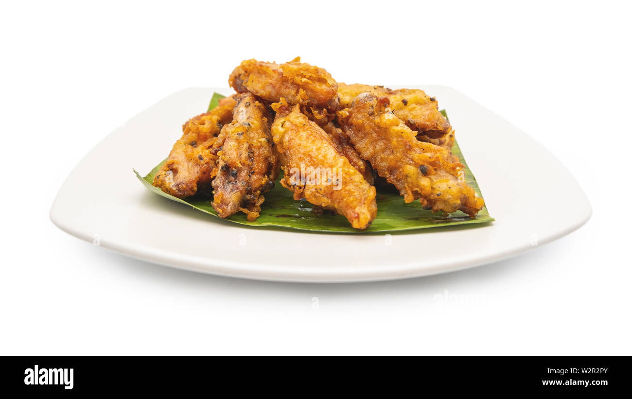 Fried chicken on white plate with white background, asia food, unhealthy food Stock Photo