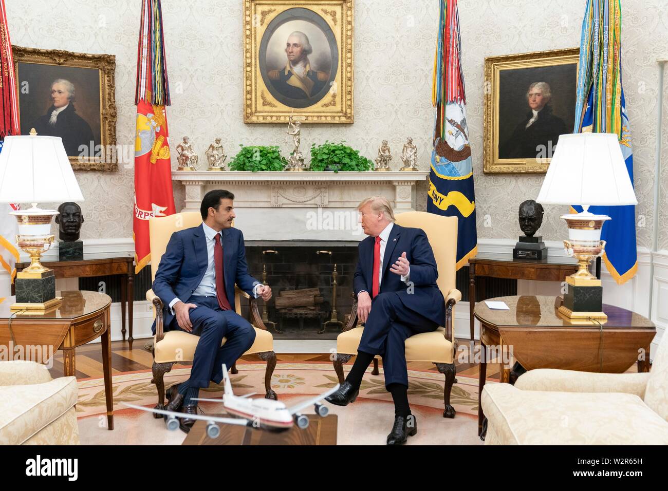 U.S President Donald Trump holds a bilateral meeting with the Emir of Qatar Tamin bin Hamad Al Thani at the Oval Office of the White House July 9, 2019 in Washington, DC. Stock Photo