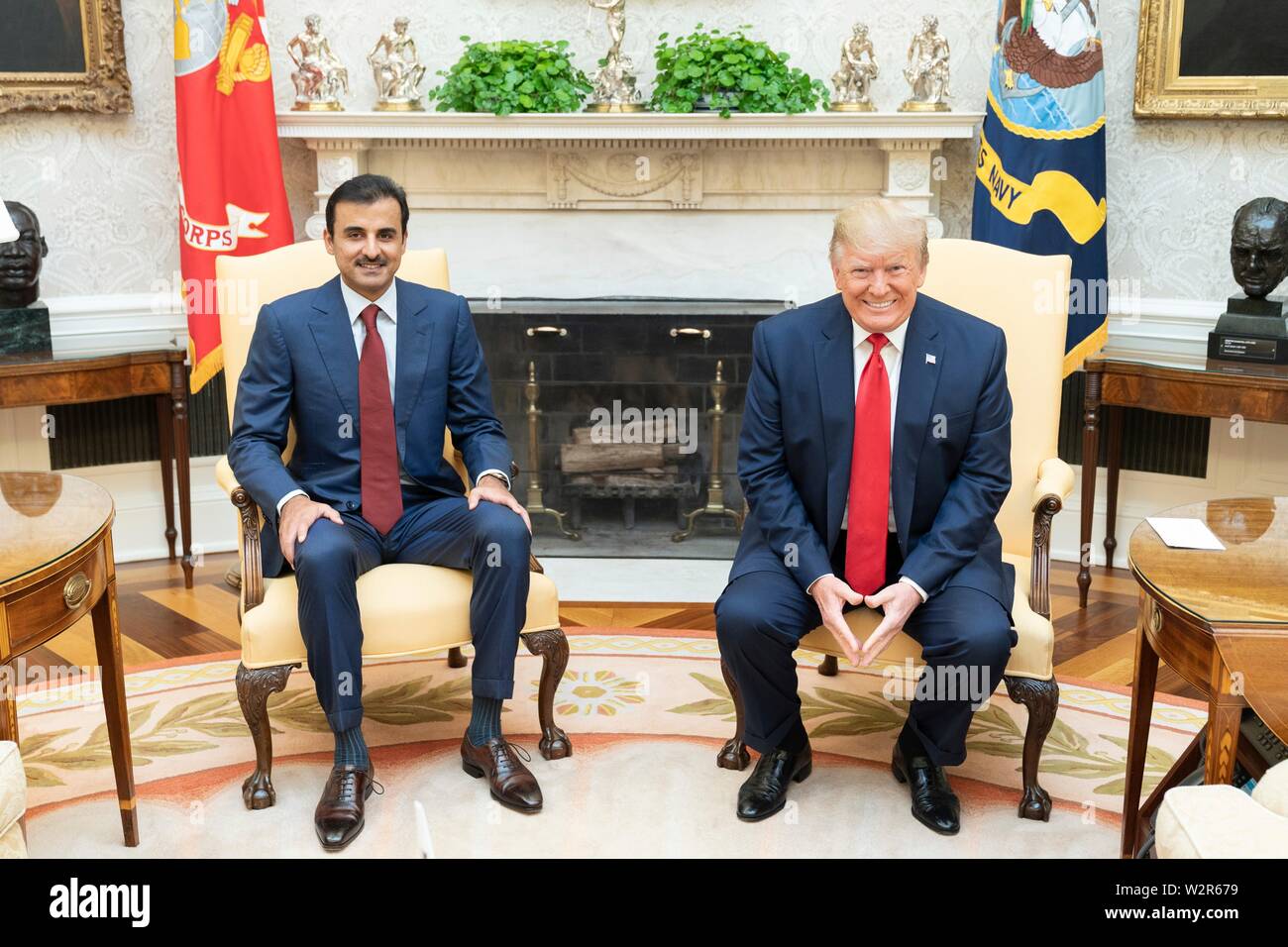 U.S President Donald Trump holds a bilateral meeting with the Emir of Qatar Tamin bin Hamad Al Thani at the Oval Office of the White House July 9, 2019 in Washington, DC. Stock Photo
