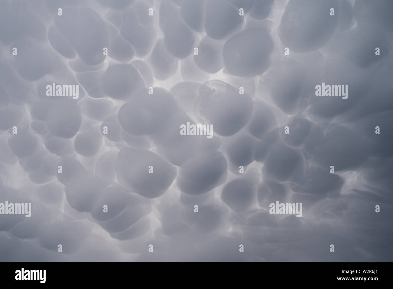 Mammatus cloudscape before a storm Stock Photo
