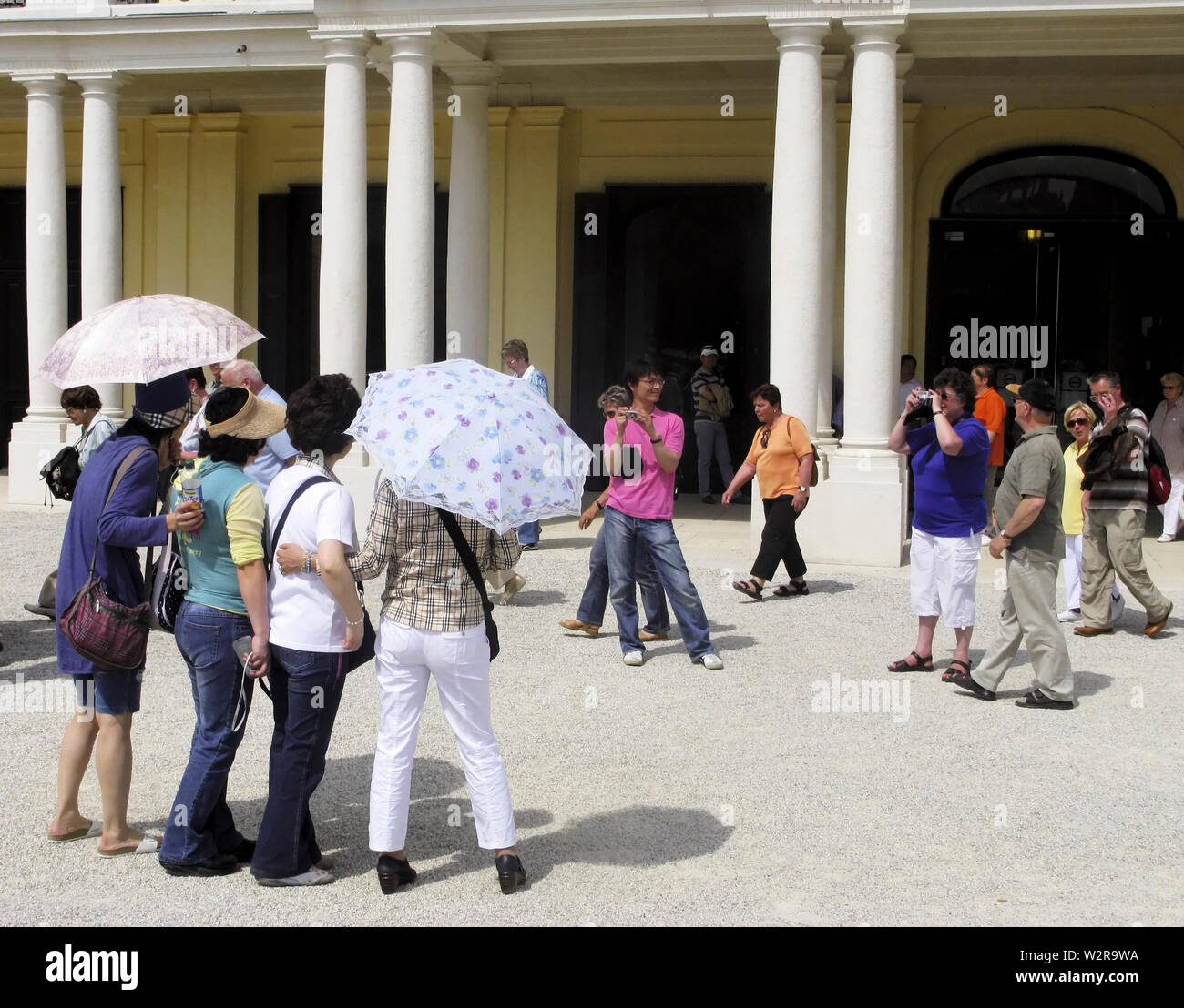 Japenese Tourists having their picture taken. The Schonbrunn Palace, near Vienna, Austria Stock Photo