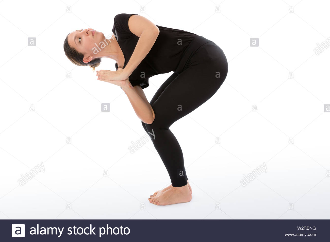 Chair Pose Twist Stock Photos Chair Pose Twist Stock Images Alamy