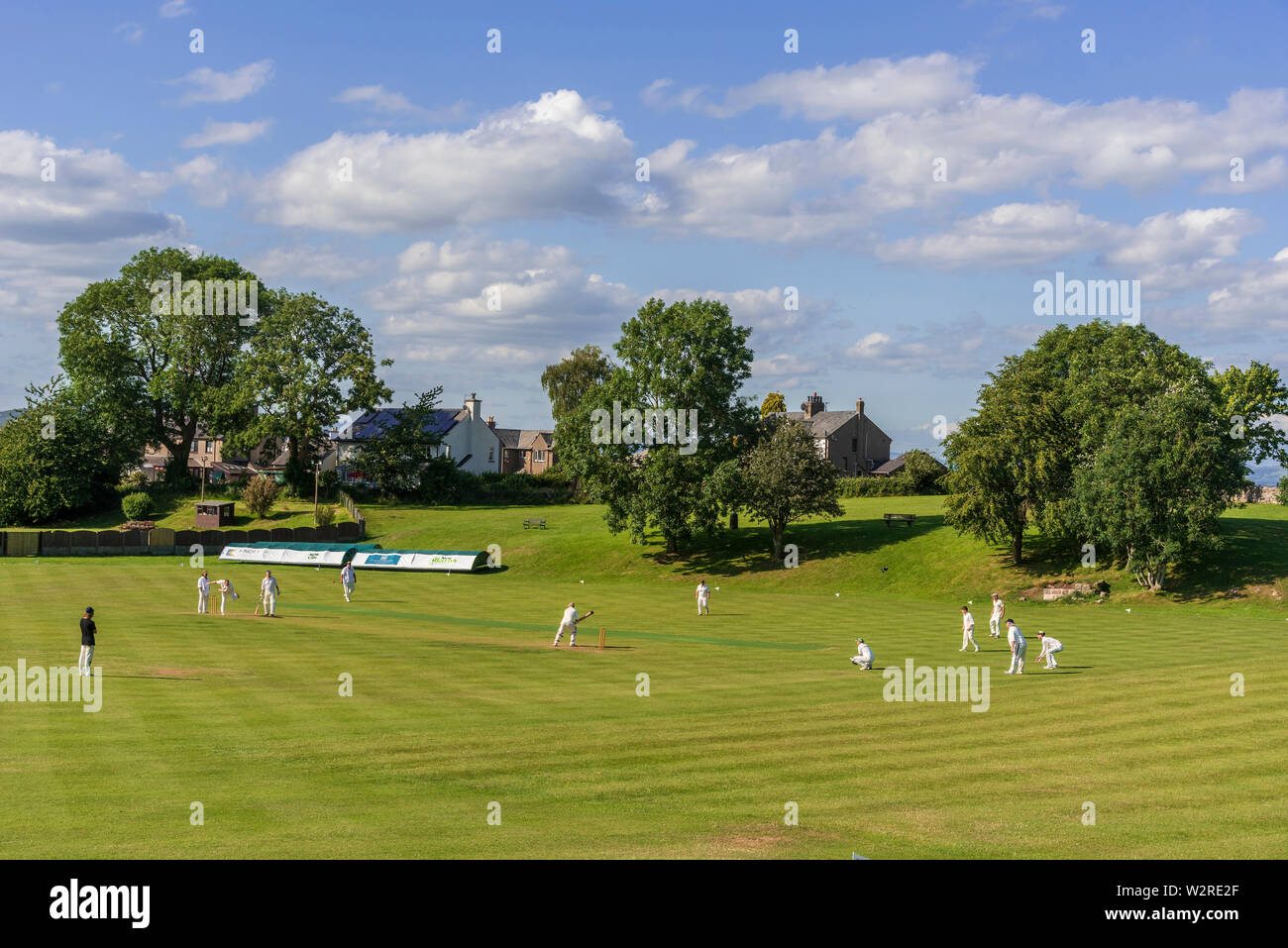 Village cricket at Arnside in Cumbria. Stock Photo