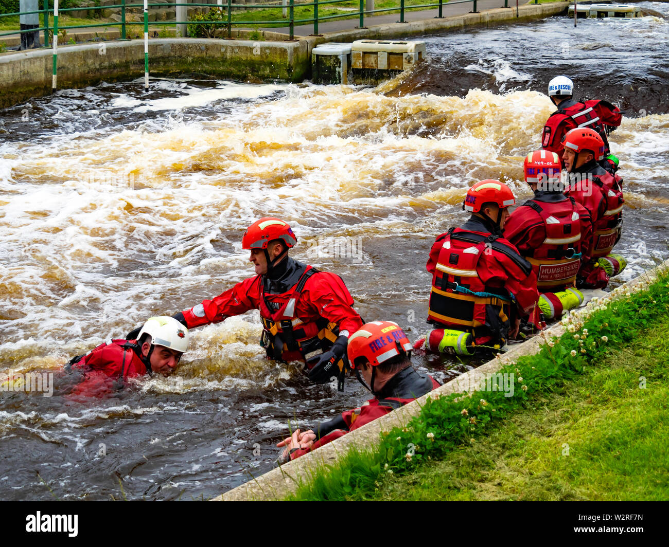 Firefighters from Humberside force training in fast water at the  Tees Barrage White Water course. Stock Photo