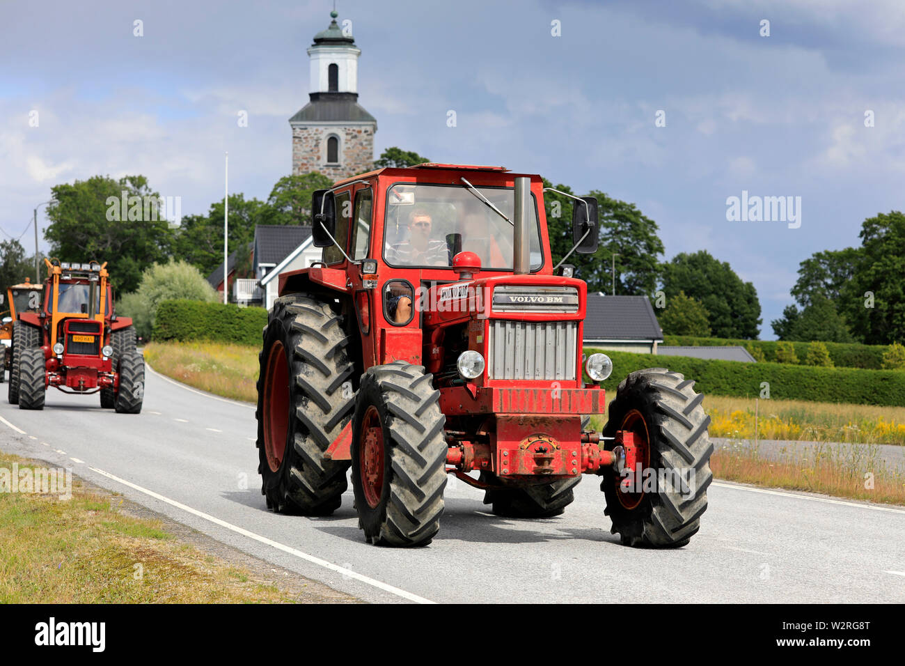 Kimito, Finland. July 6, 2019. Red Volvo BM 814 tractor on Kimito Tractorkavalkad, annual vintage tractor parade. The 814 was introduced in 1969. Stock Photo
