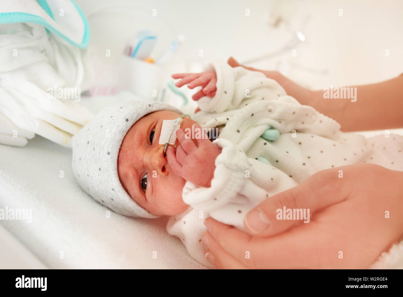 Close up of an infant with nose feeding tube, ICU Stock Photo Alamy
