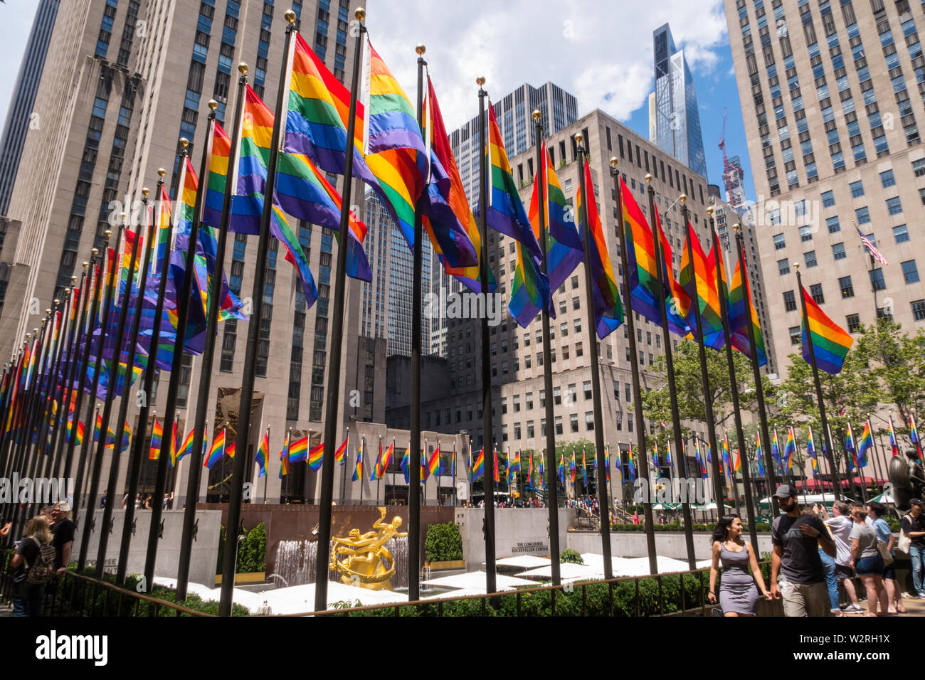 Rainbow color flags celebrate WorldPride at Rockefeller Center Plaza, NYC, USA Stock Photo