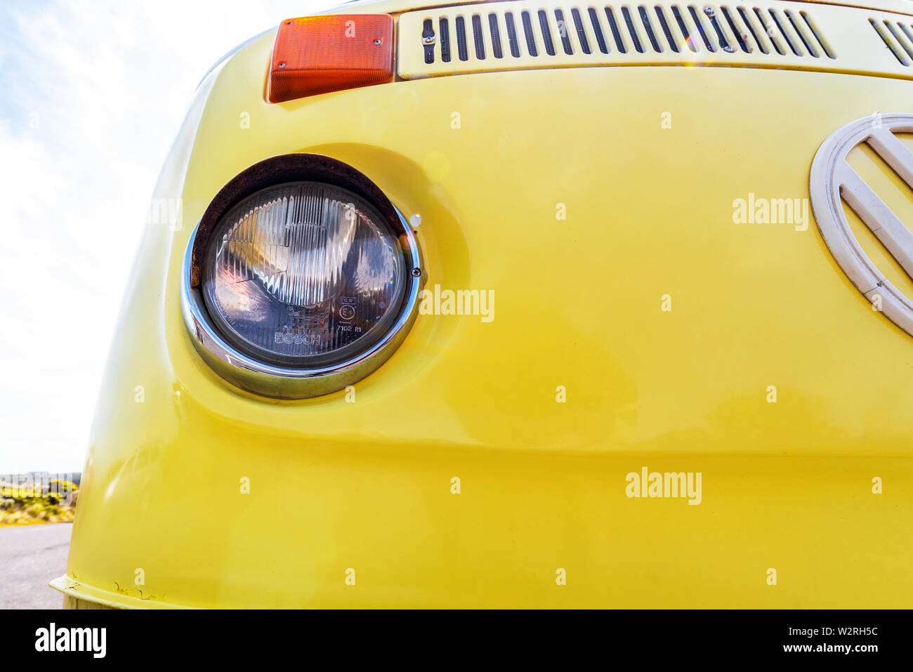 VICTORIA, AUSTRALIA - OCTOBER 30, 2018: Yellow retro Volkswagen van on the road. Close-up. Stock Photo
