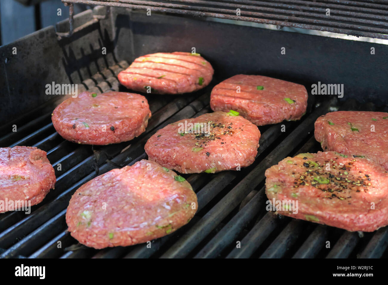 Hamburger Patties on a Hot Grill, USA Stock Photo Alamy